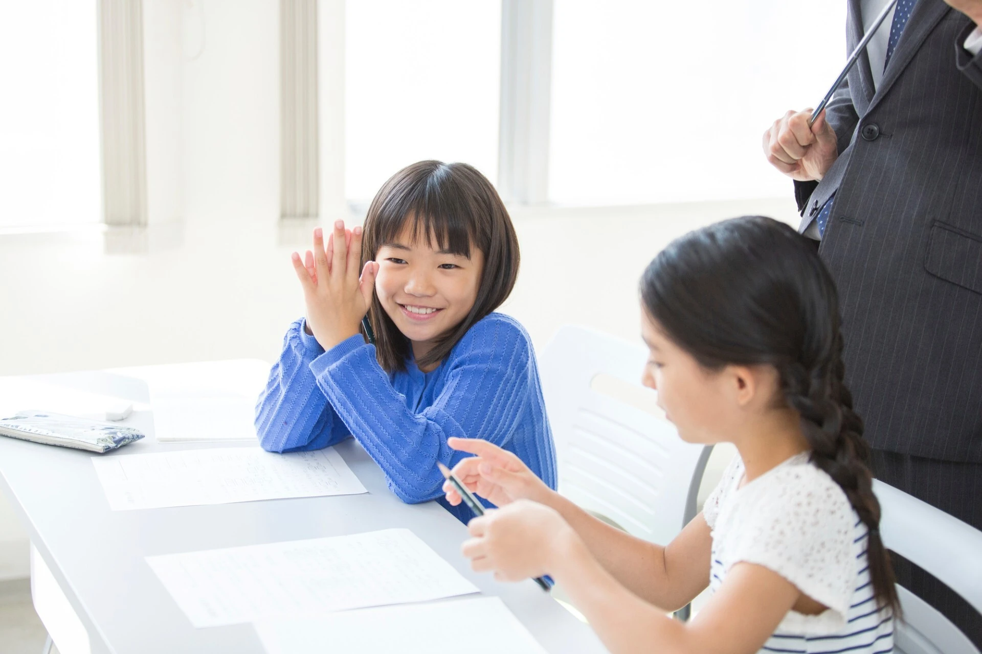 生徒を励ます先生